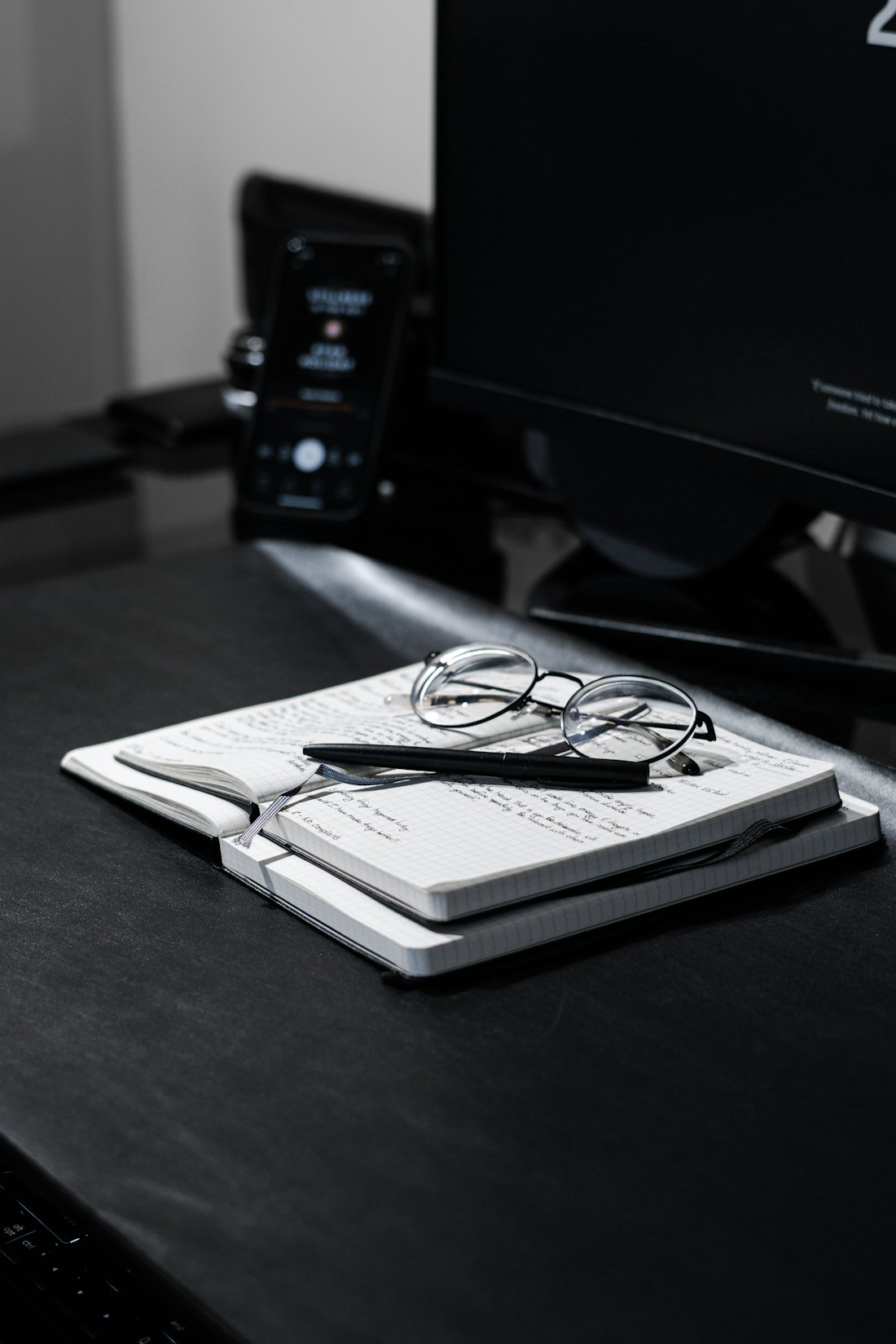 The planner and tracker on a dark surface